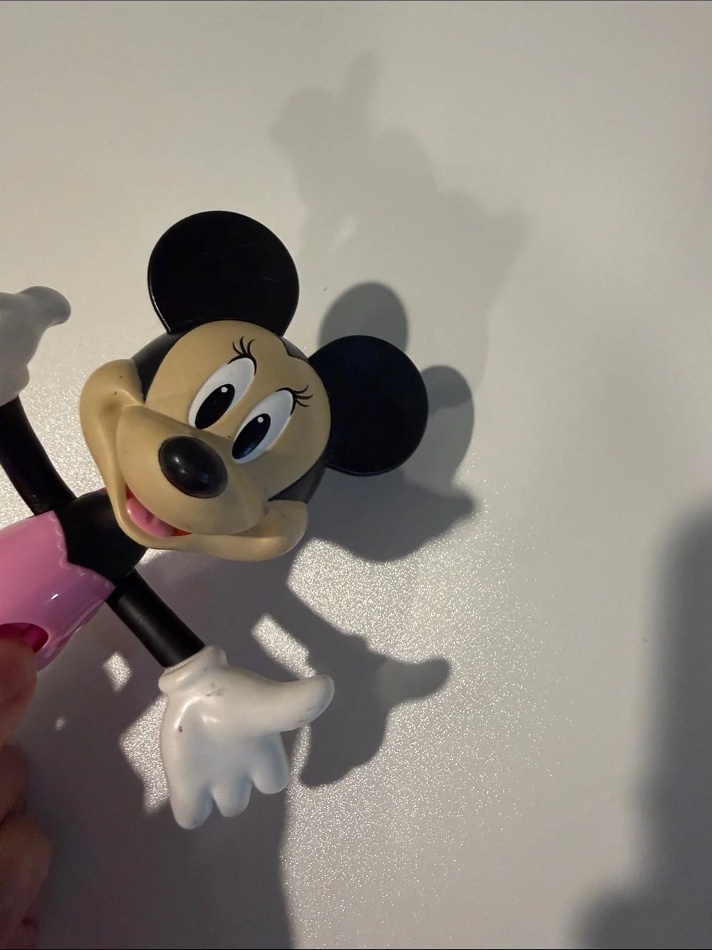 Minnie Mouse with push button arms and head figurine